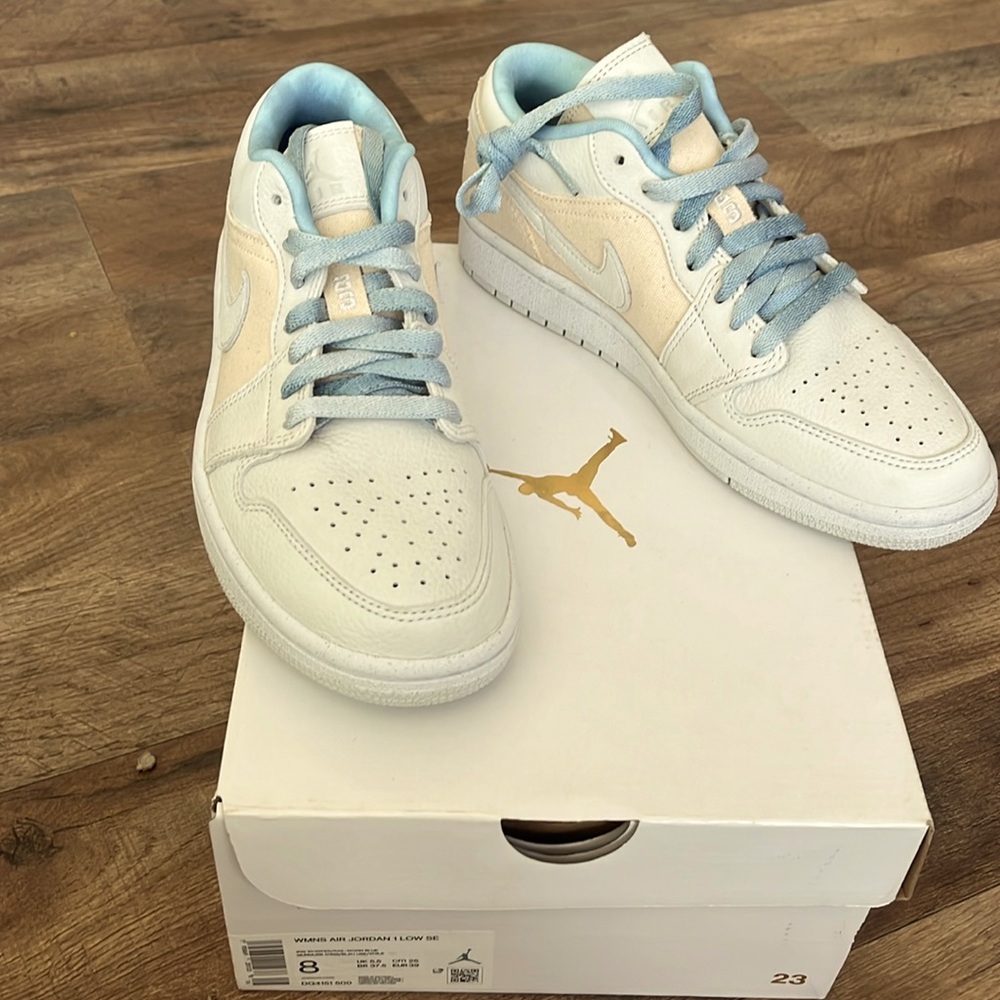 Brand new, never been worn women’s Air Jordan 1 low se “grey cream.”